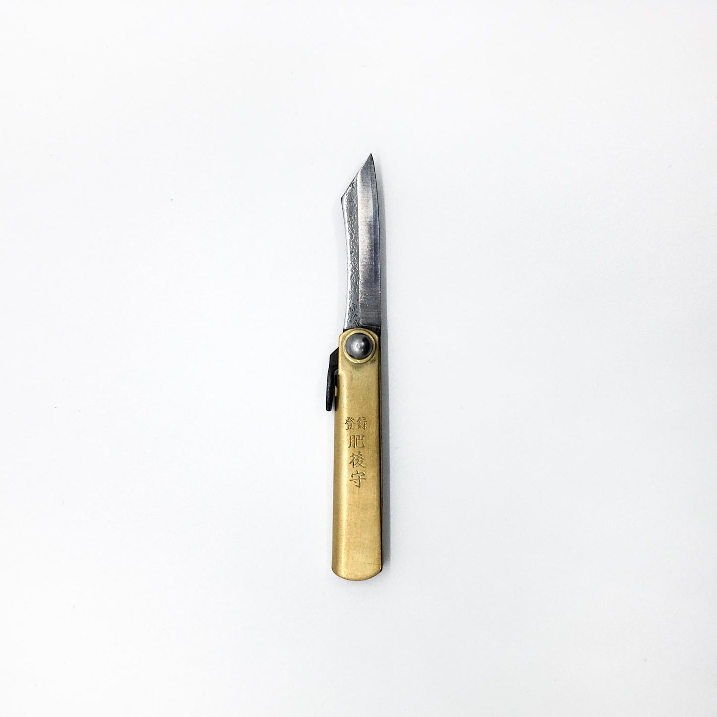 a gold foldable pocket knife with japanese writing embossed logo on handle