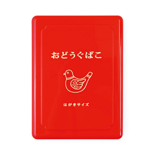 Japanese retro-style post card size small plastic tool box container in red, with gold bird illustration and Japanese writing, "Odogu-bako"