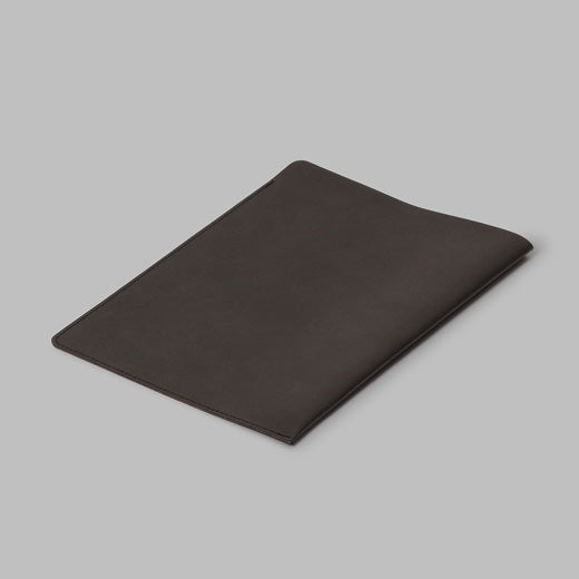 a minimal plain black soft faux leather tablet sleeve case